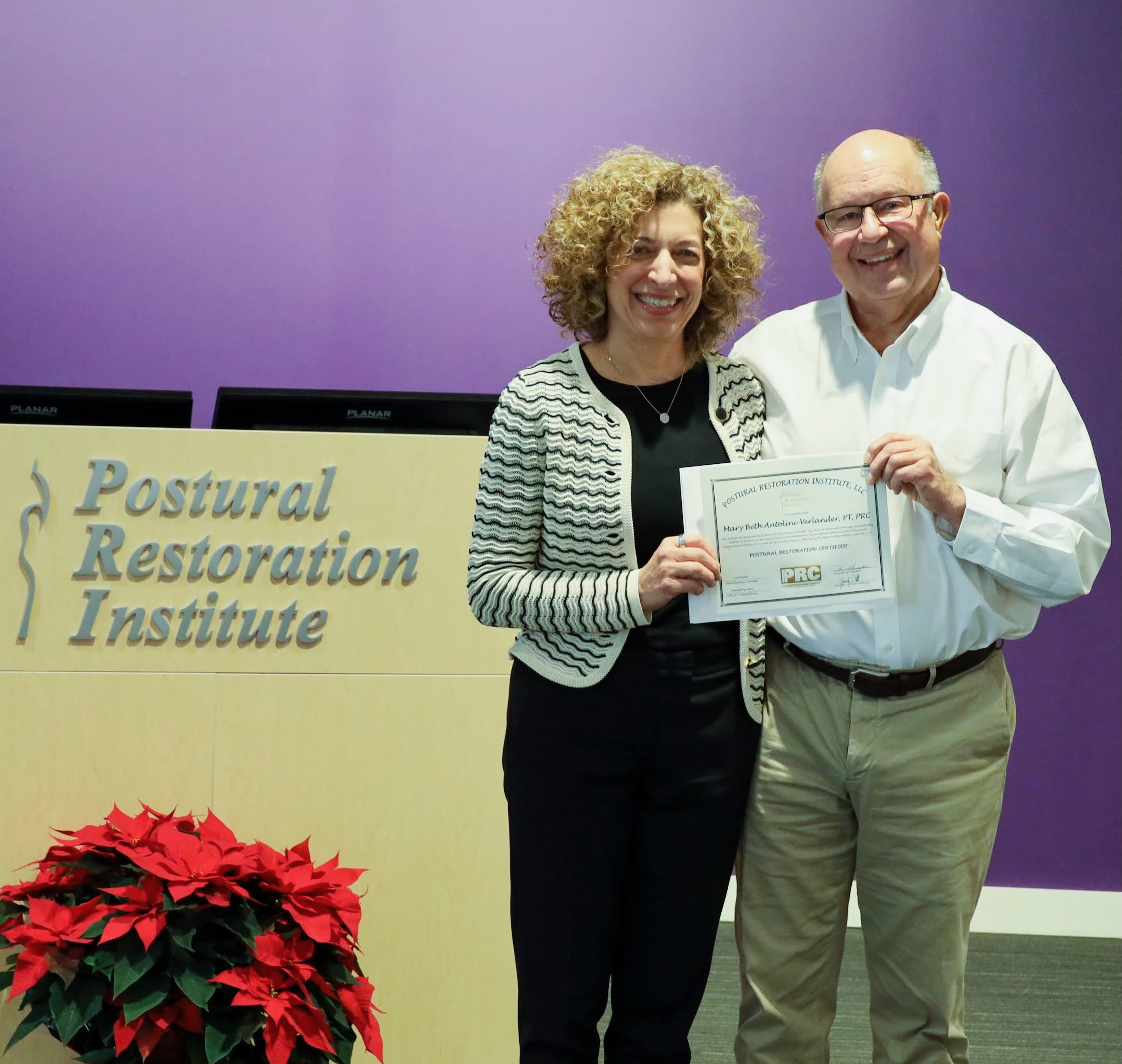 Mary Beth Antolini Verlander receiving her Postural Restoration Certified credential at the Postural Restoration Institute